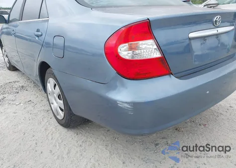 2002 Toyota Camry Le z USA, uszkodzony, nr VIN 4T1BE32K22U573578